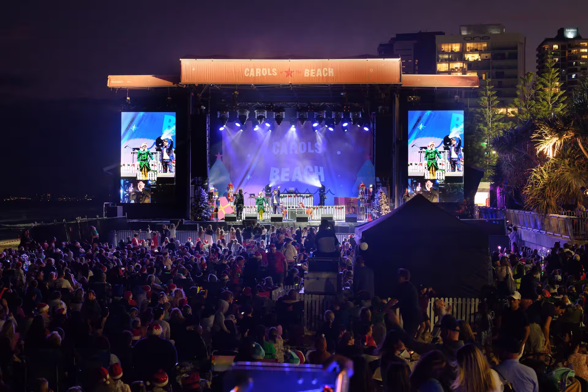 Guests enjoying an outdoor event by the coast
